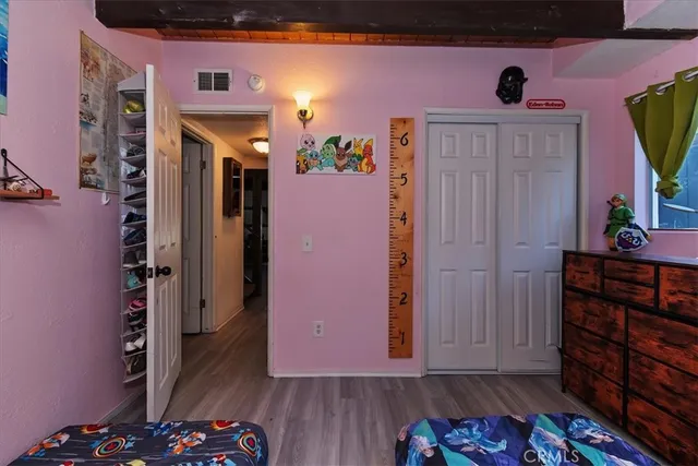 a view of livingroom with furniture and toys