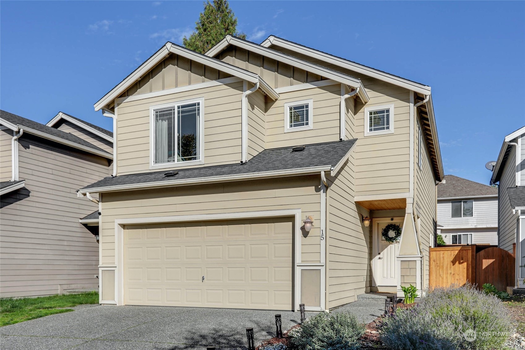 15 194th Street Southwest Bothell, WA 98012 - Photo 2 of 27 a front view of a house with white walls