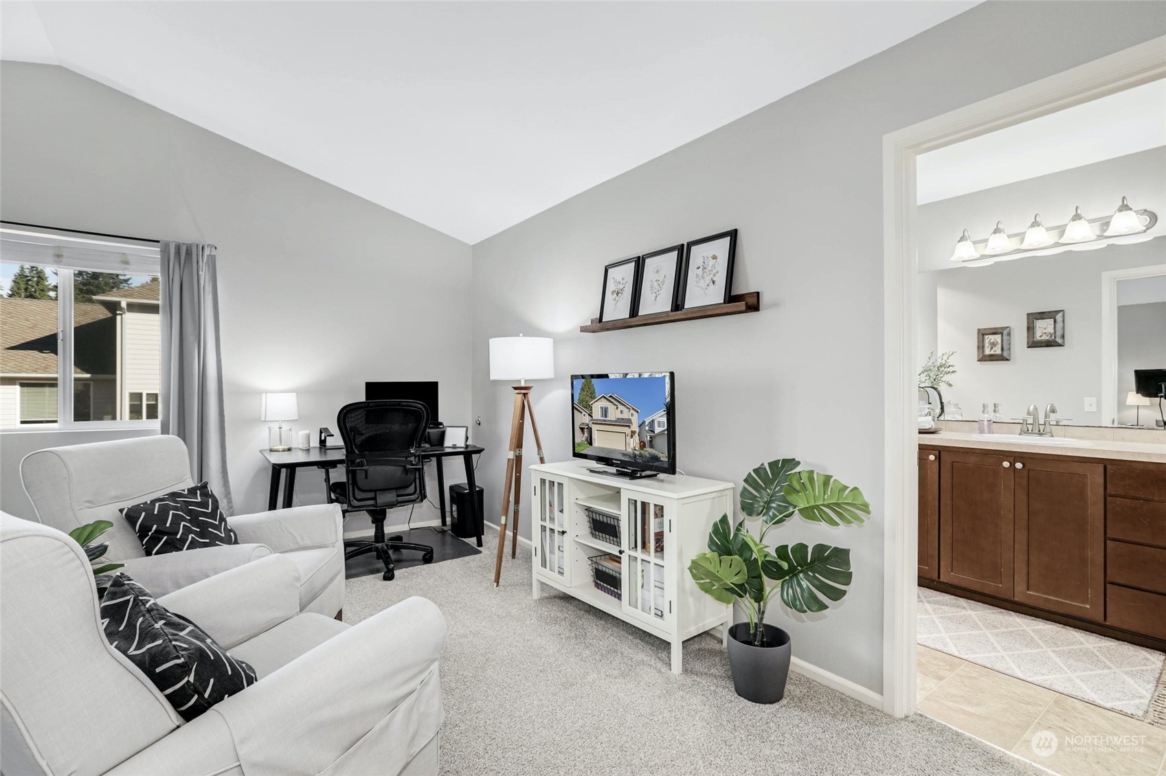 15 194th Street Southwest Bothell, WA 98012 - Photo 21 of 27 a living room with furniture a potted plant and a sink