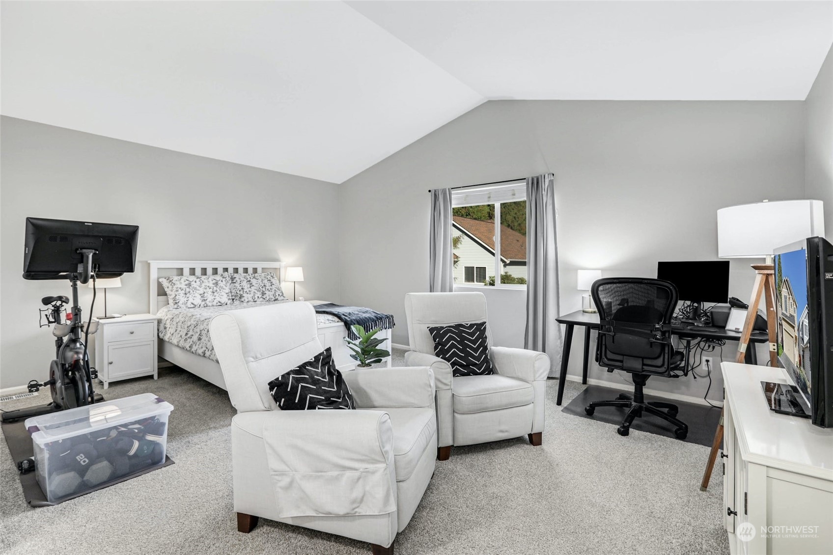15 194th Street Southwest Bothell, WA 98012 - Photo 22 of 27 a living room with furniture and a flat screen tv