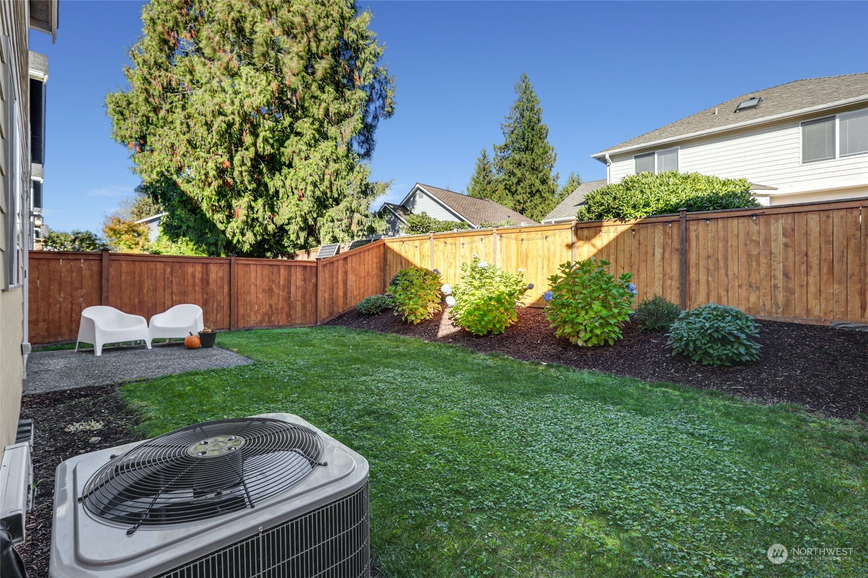 15 194th Street Southwest Bothell, WA 98012 - Photo 26 of 27 a house view with a garden space