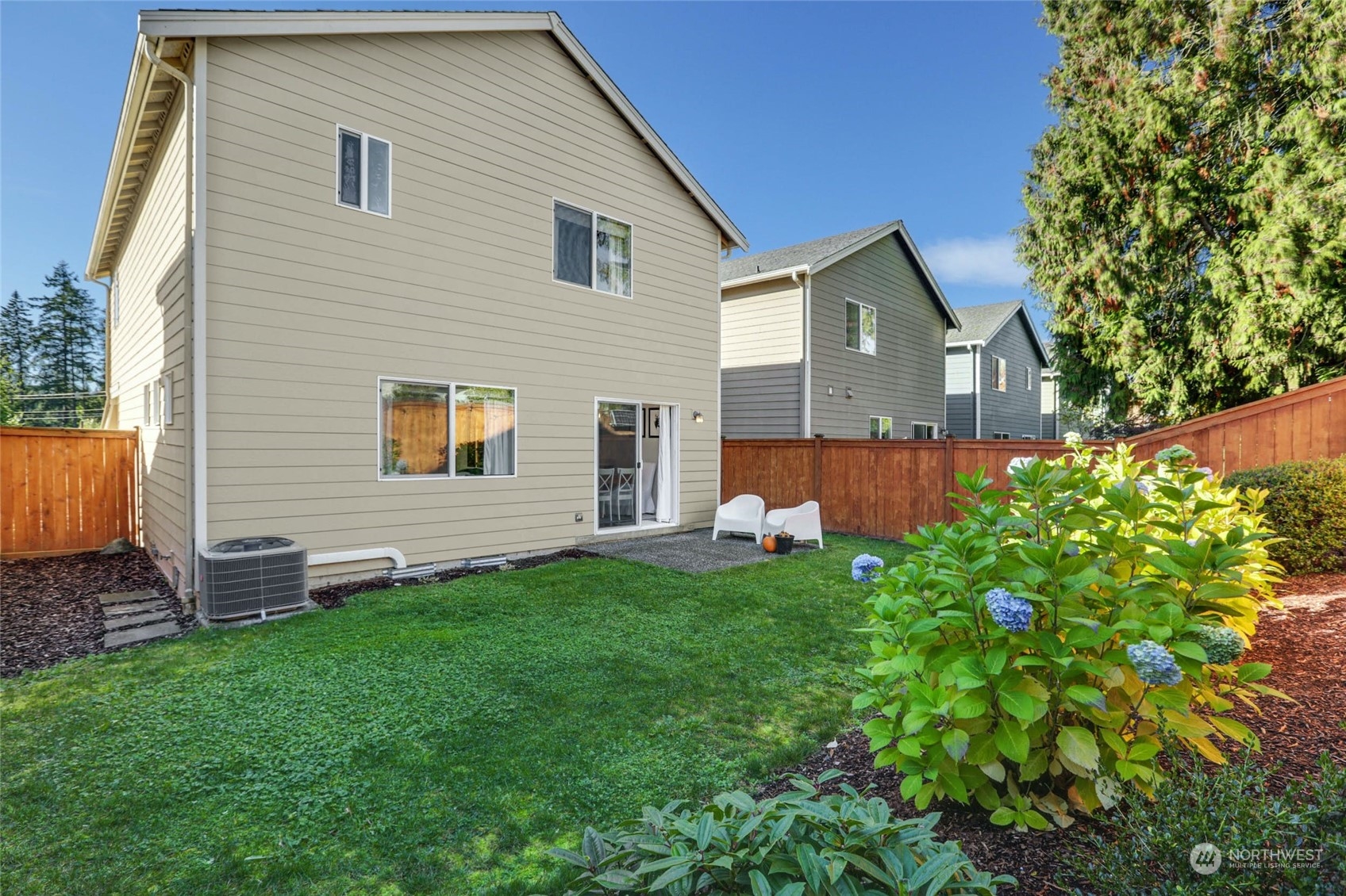 15 194th Street Southwest Bothell, WA 98012 - Photo 27 of 27 a front view of a house with garden