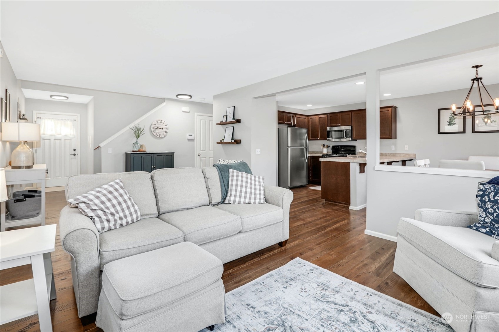 15 194th Street Southwest Bothell, WA 98012 - Photo 6 of 27 a living room with furniture and kitchen view