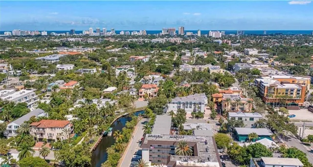 an aerial view of a city with lots of residential buildings