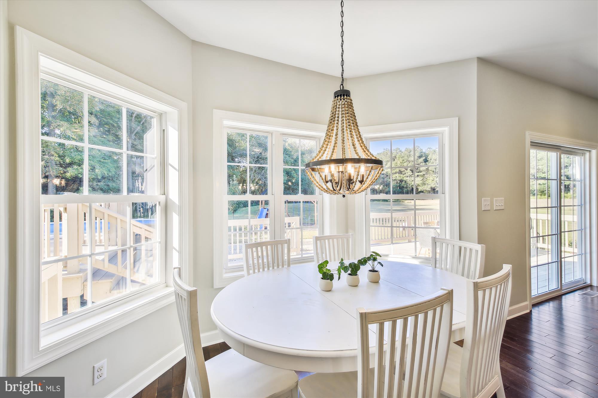 9044 Davis Road Pittsville, MD 21850 - Photo 15 of 43 a view of a dining room with furniture window and wooden floor