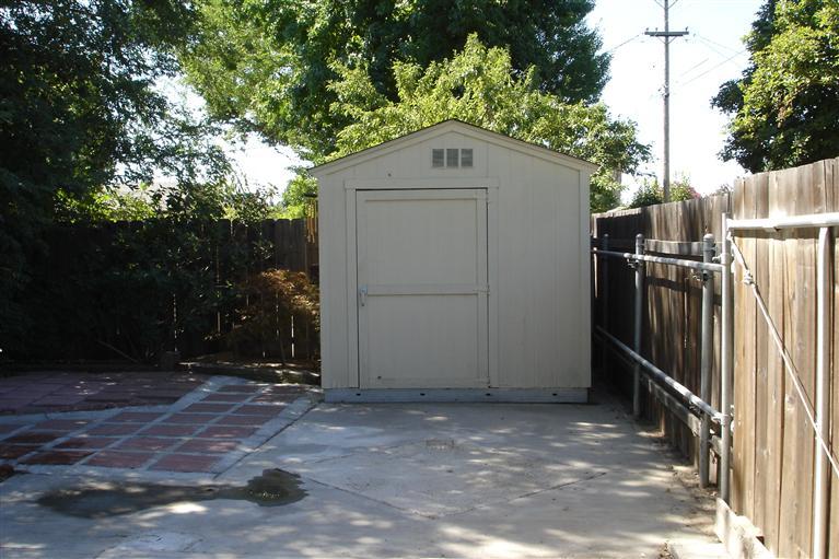 1337 South Klein Avenue Reedley, CA 93654 - Photo 7 of 11 Extra storage building and large gate for RV access.
