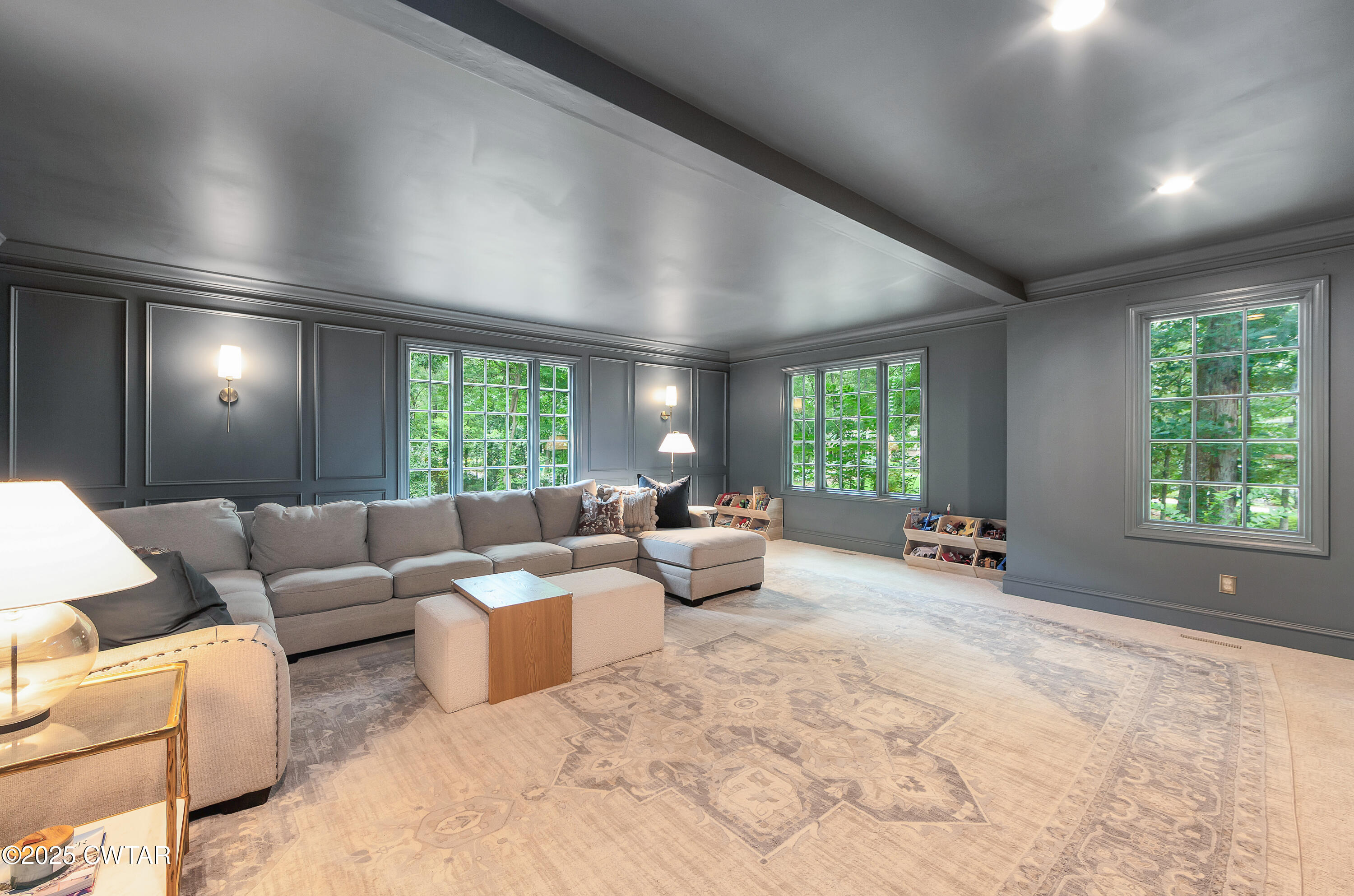 25 Whitfield Cove Jackson, TN 38305 - Photo 16 of 35 a living room with furniture and a large window