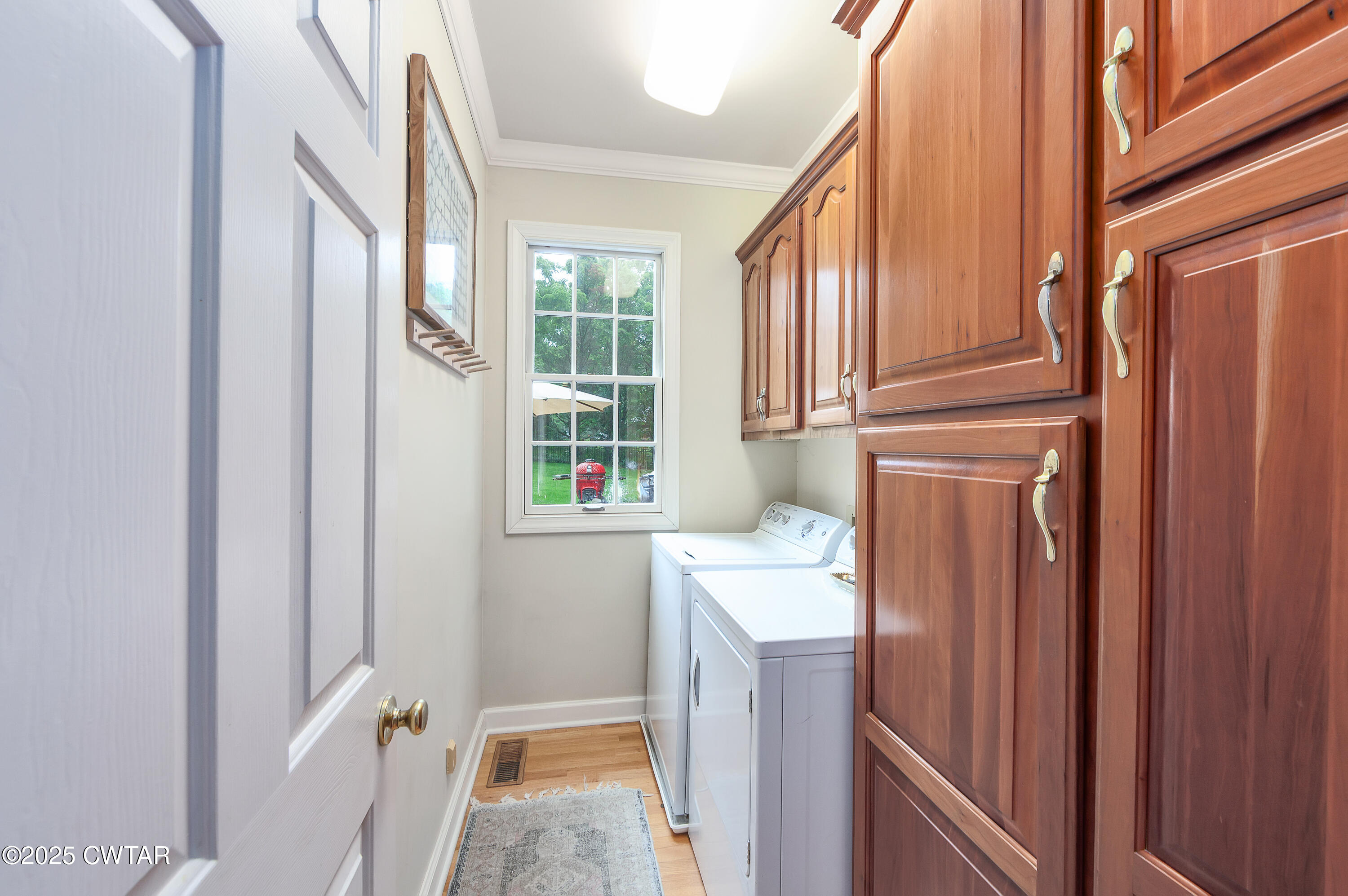 25 Whitfield Cove Jackson, TN 38305 - Photo 20 of 35 a view of a storage and utility room with a window