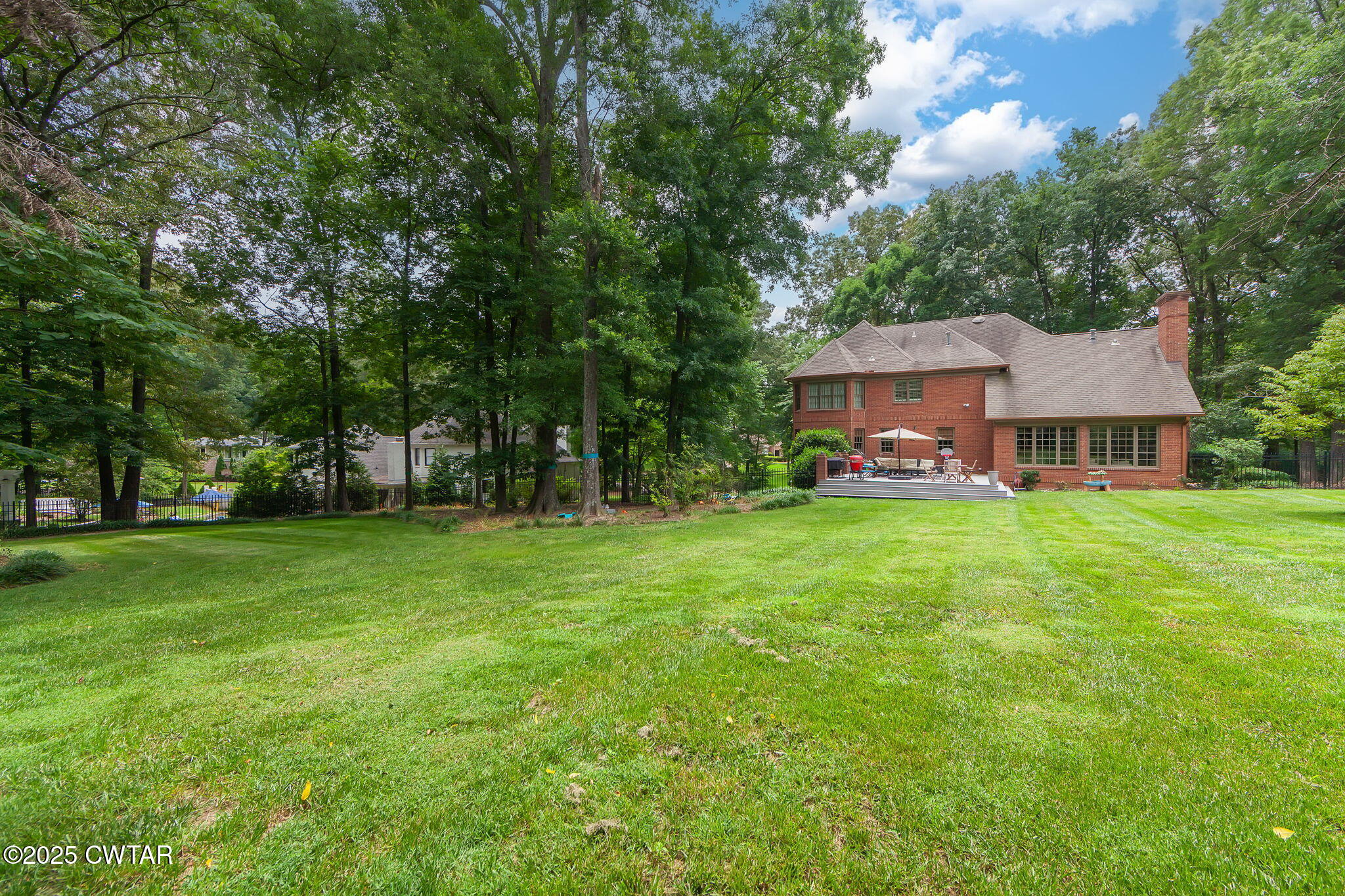25 Whitfield Cove Jackson, TN 38305 - Photo 31 of 35 a view of a house with a big yard