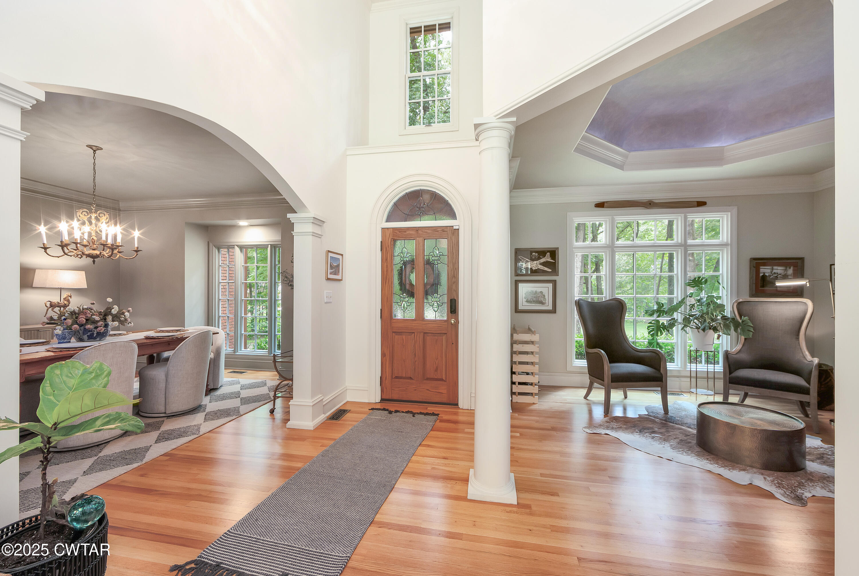25 Whitfield Cove Jackson, TN 38305 - Photo 6 of 35 a living room with furniture fireplace and wooden floor