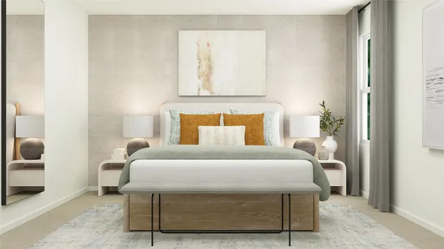 a bedroom with a bed and lamp