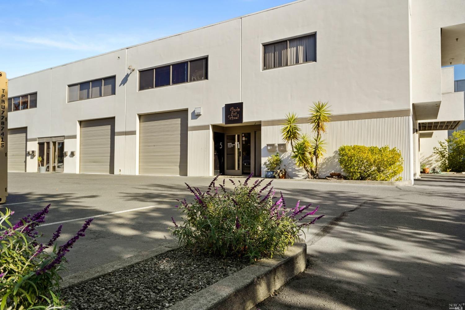 74 Digital Drive, Unit 11 Novato, CA 94949 - Photo 1 of 1 a front view of a house with a yard