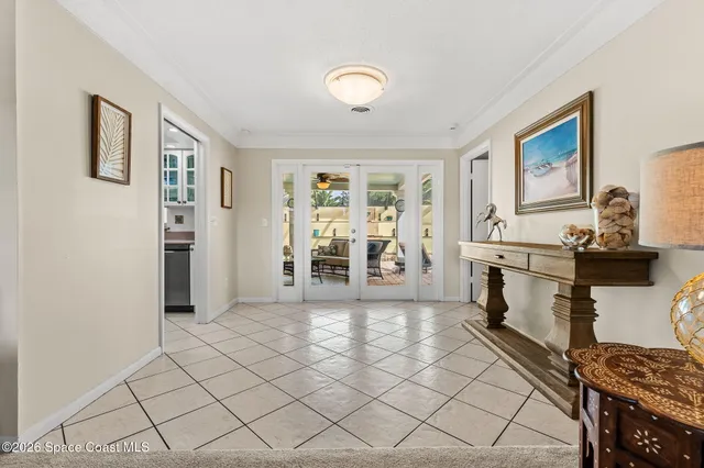 a view of a livingroom with furniture and workspace