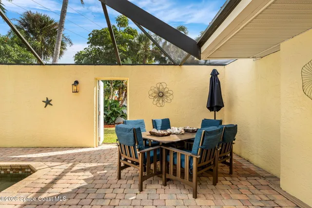 a view of a swimming pool with a lounge chairs