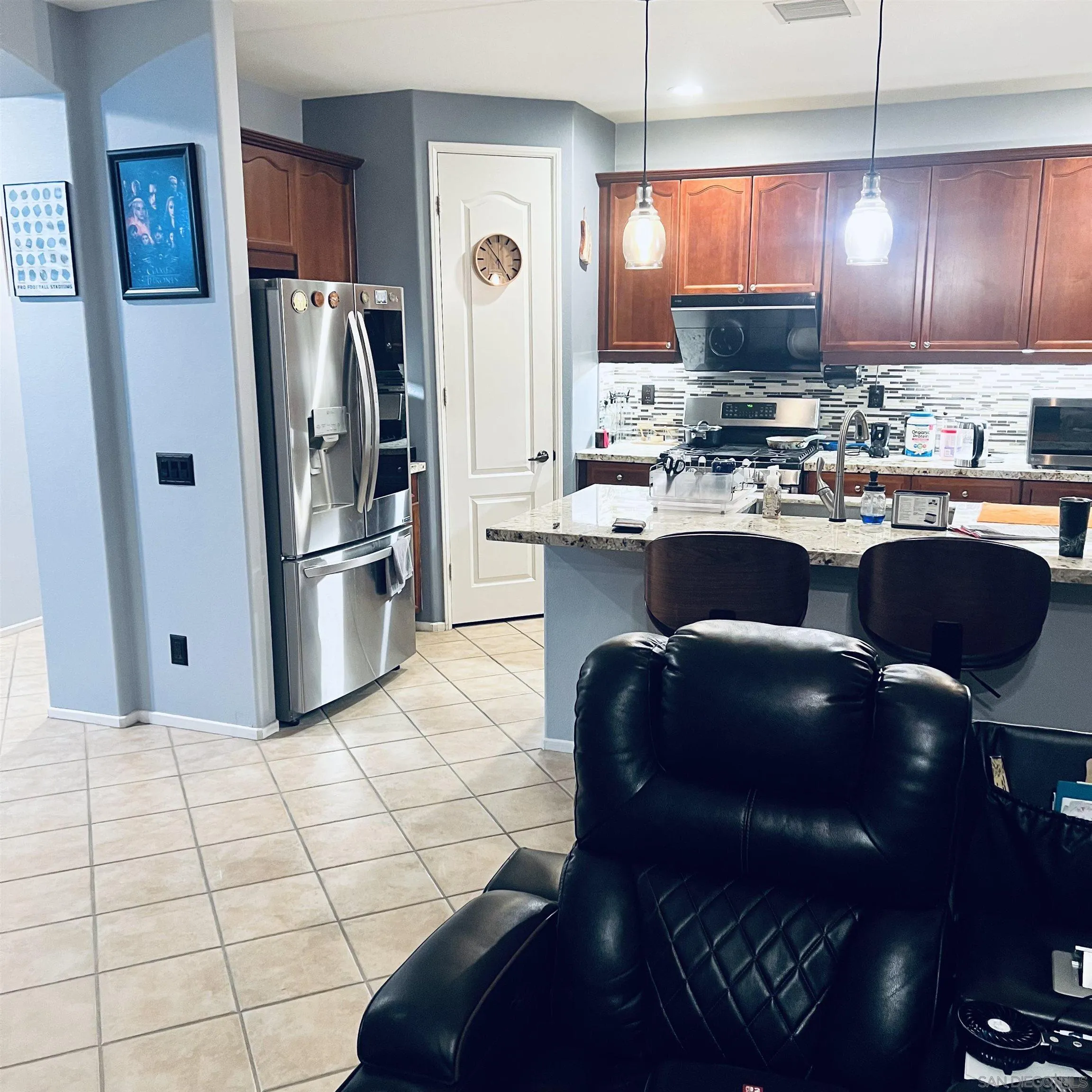 44482 Avenida Suarez Indio, CA 92201 - Photo 10 of 12 a kitchen with stainless steel appliances granite countertop a refrigerator a stove a sink and a refrigerator