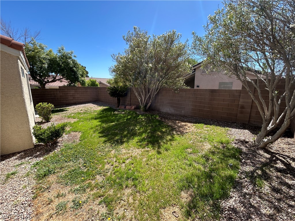 1840 Montvale Las Vegas, NV 89134 - Photo 31 of 31 A fully enclosed yard with ample space for gardening and outdoor enjoyment.