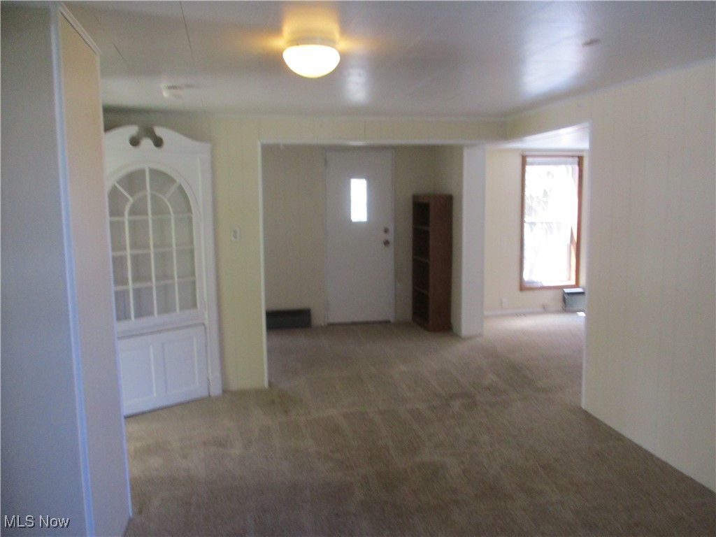 15401 A Madison Road Middlefield, OH 44062 - Photo 16 of 17 Central room in the house with carpet