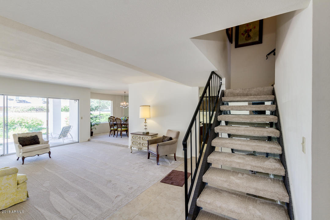 36 East Piping Rock Road Phoenix, AZ 85022 - Photo 10 of 39 Great Room and Stairs
