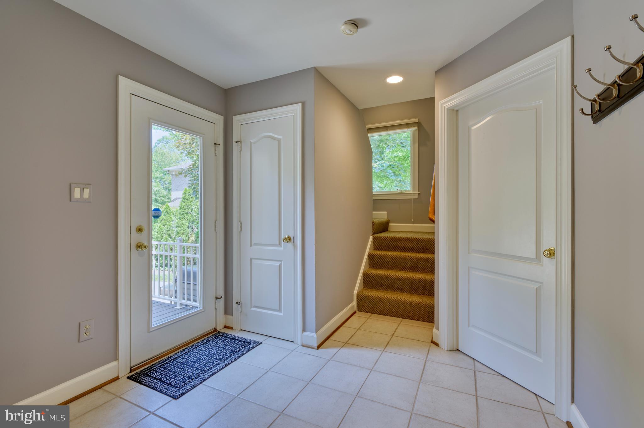 11098 Whitstone Place Reston, VA 20194 - Photo 42 of 76 Main Level Mudroom (stairs up to private suite)