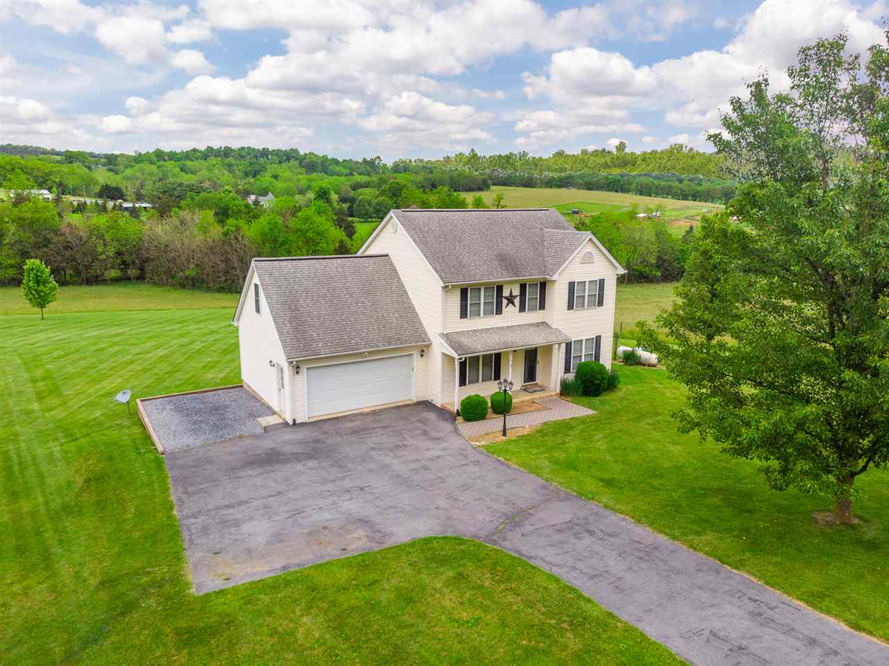 295 Todd Road Mount Sidney, VA 24467 - Photo 1 of 50 a view of a big house with a big yard and large tree