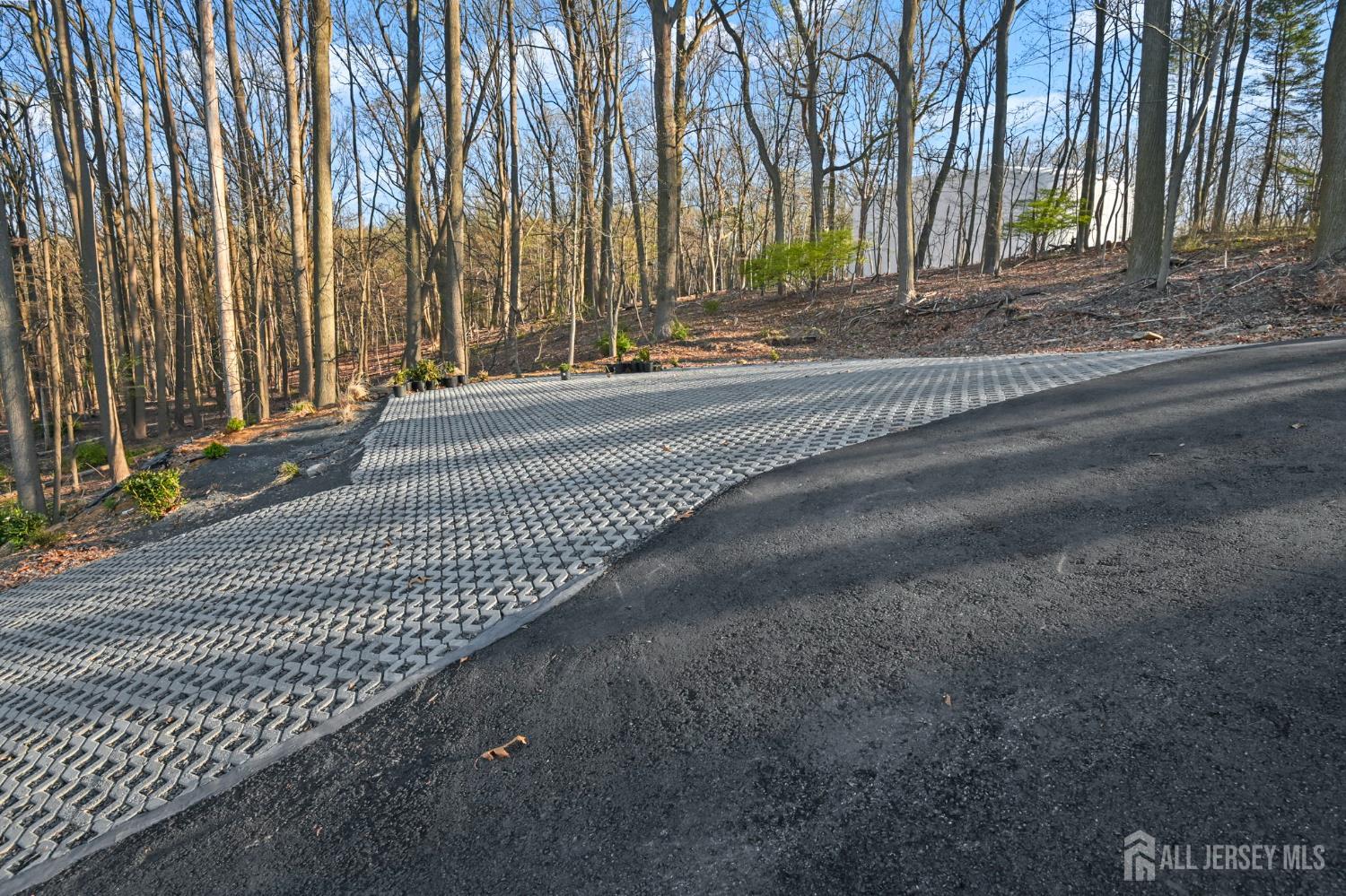 120 Nolan Road Morganville, NJ 07751 - Photo 68 of 85 a view of a street with a building in the background