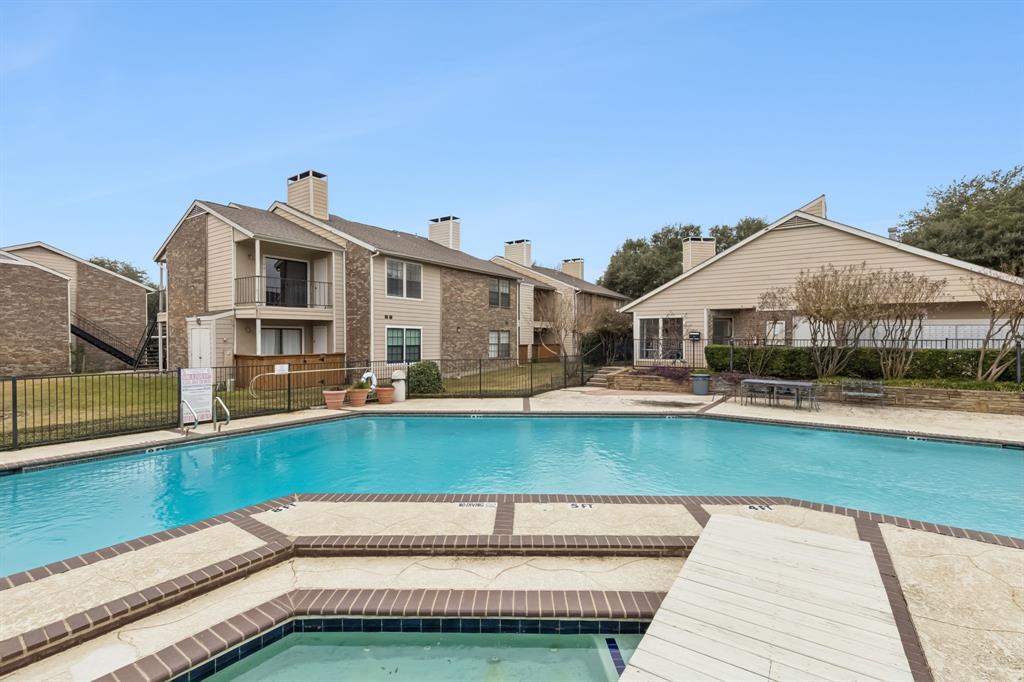 4748 Old Bent Tree Lane, Unit 1808 Dallas, TX 75287 - Photo 26 of 28 a view of a house with pool and chairs