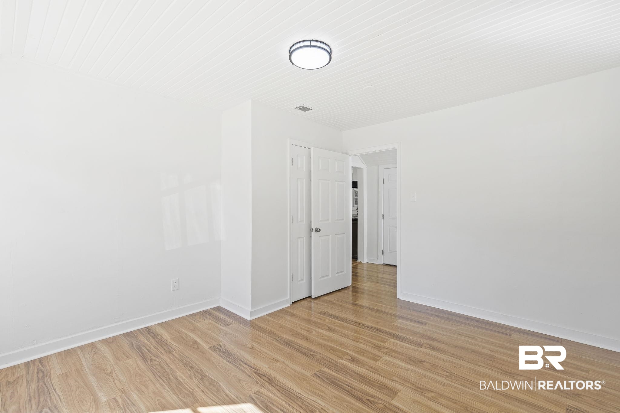 1400 North Cloverleaf Circle Mobile, AL 36605 - Photo 11 of 17 Unfurnished room with light wood-type flooring