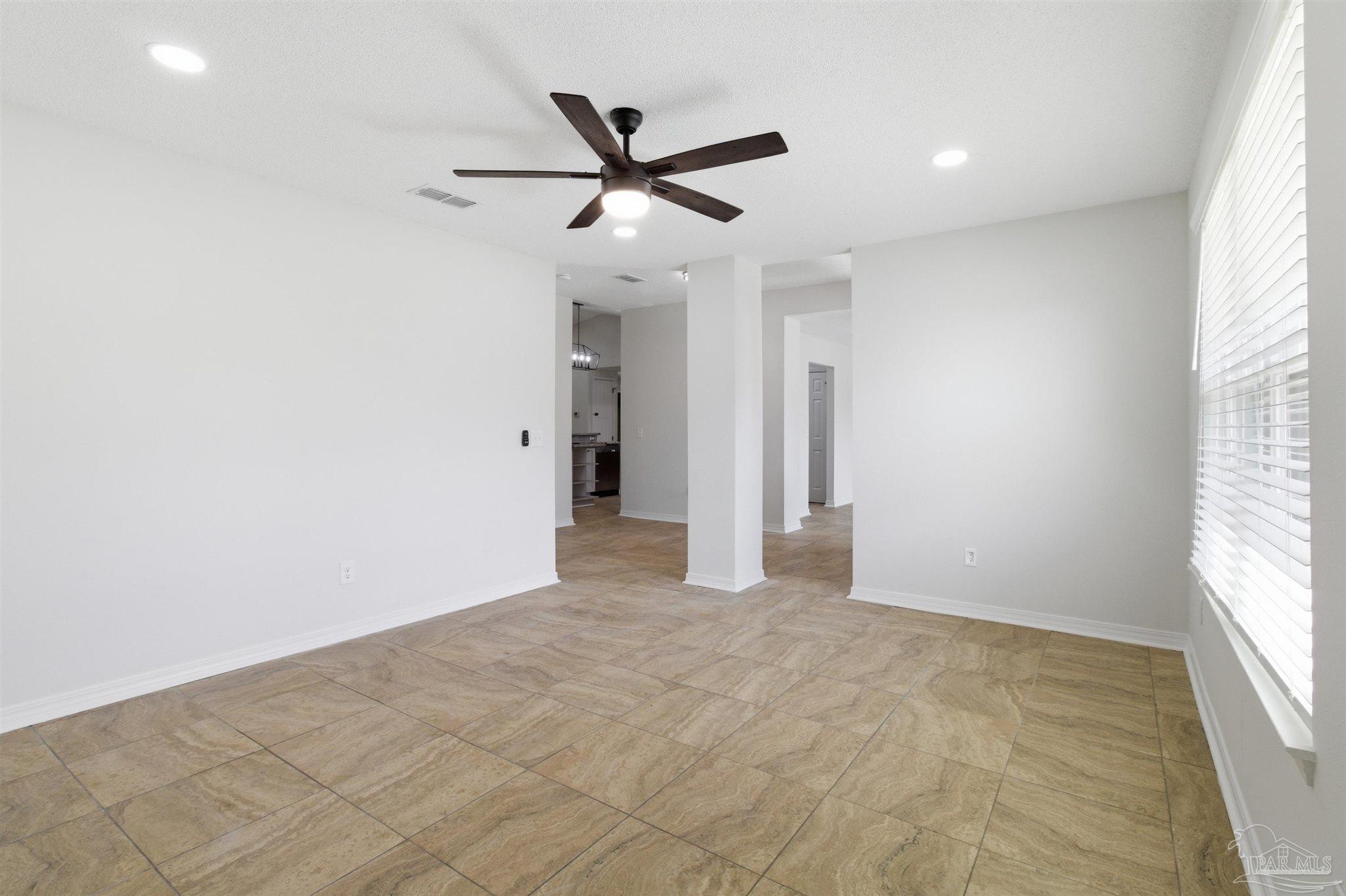 1866 Wareham Way Cantonment, FL 32533 - Photo 13 of 33 an empty room with closet and windows