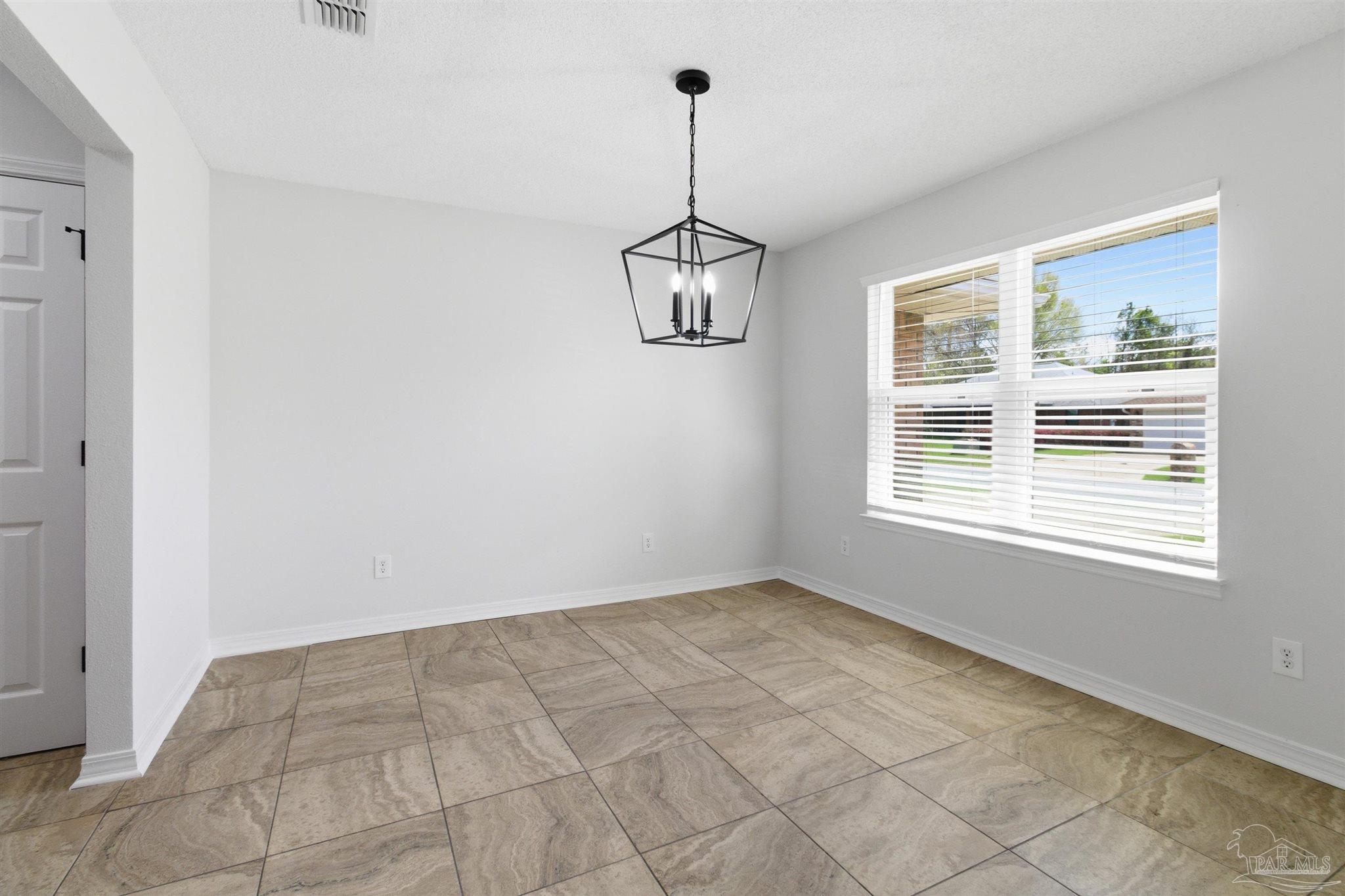 1866 Wareham Way Cantonment, FL 32533 - Photo 14 of 33 a view of a room with windows