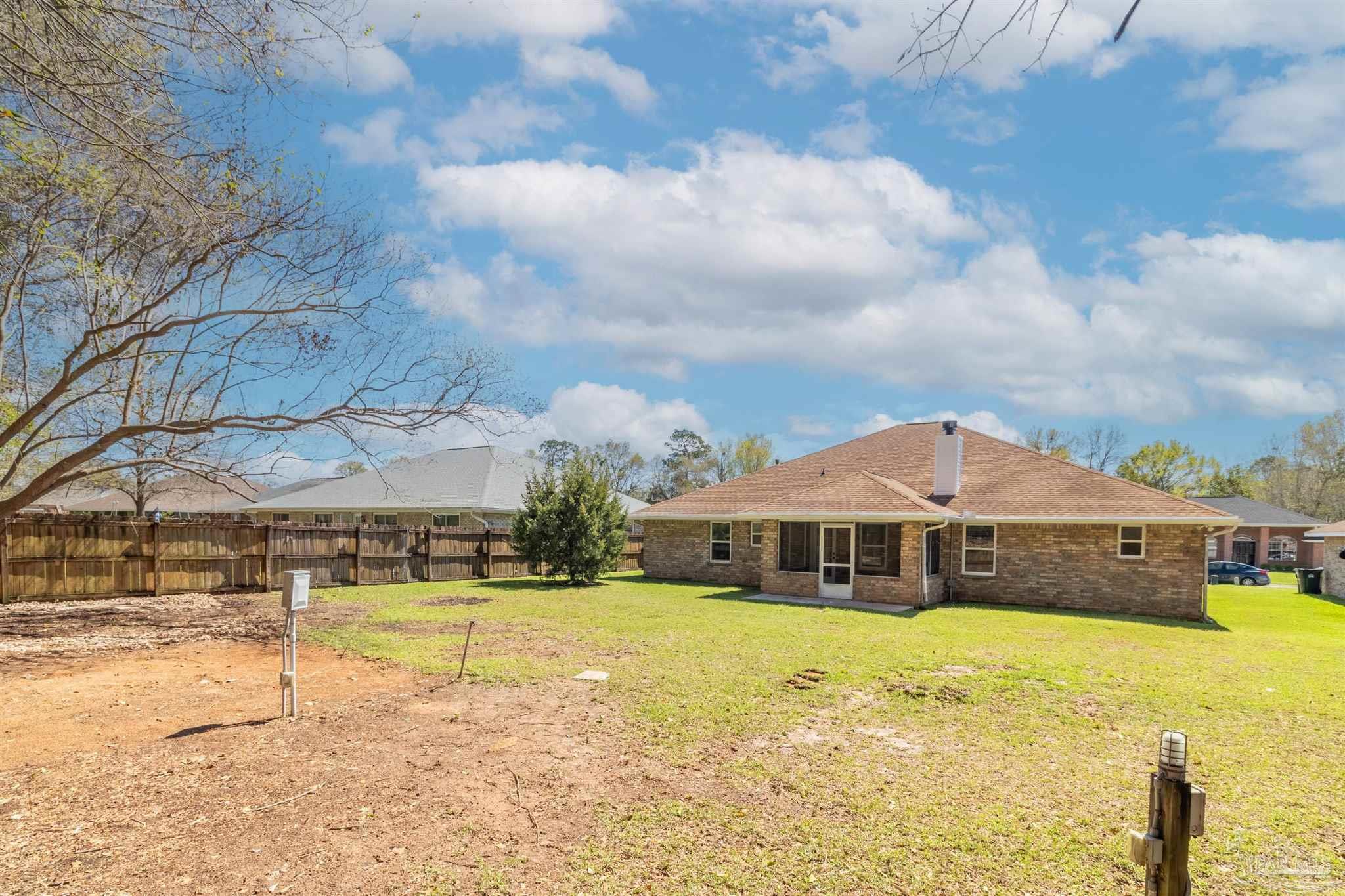 1866 Wareham Way Cantonment, FL 32533 - Photo 31 of 33 a view of a house with swimming pool