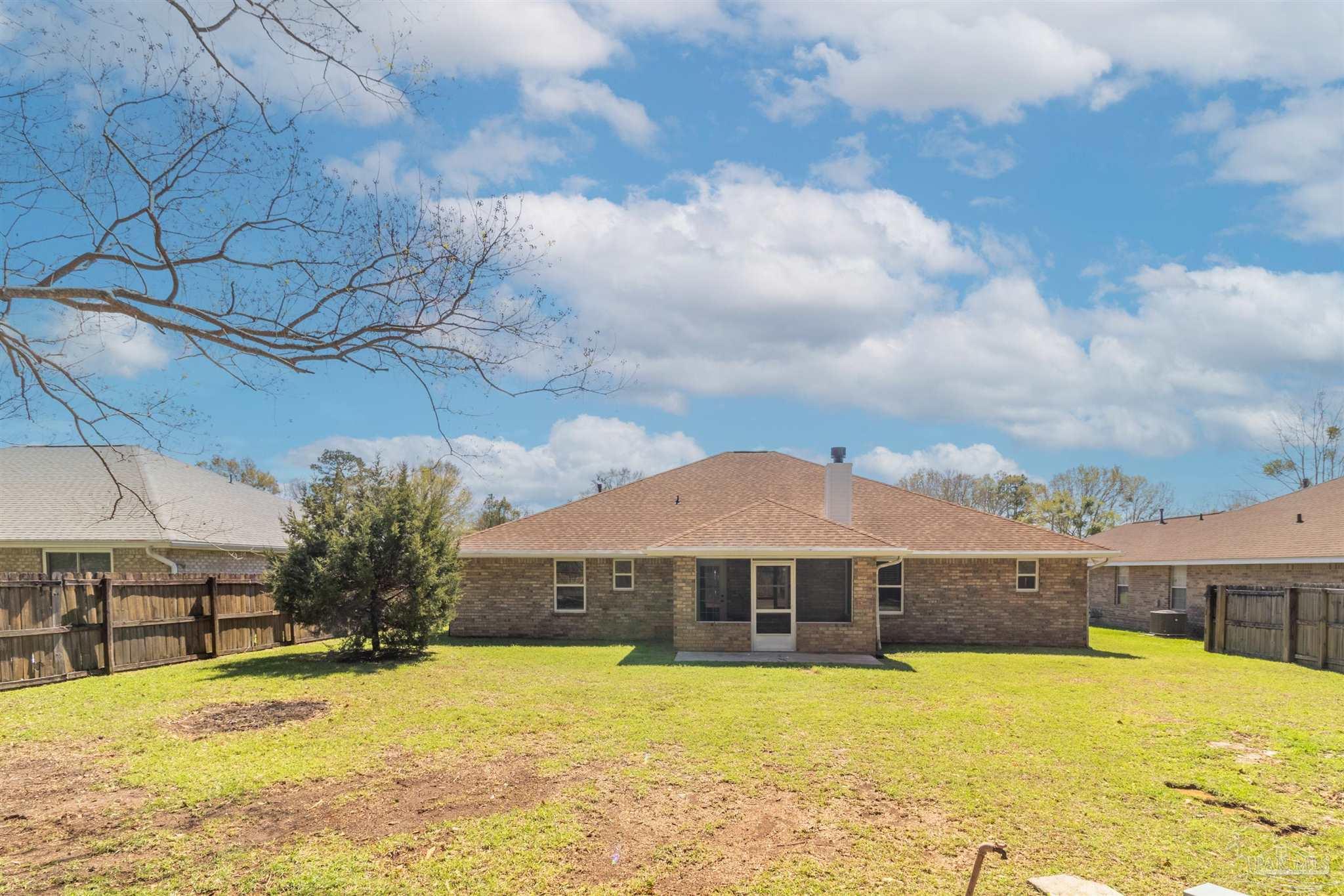 1866 Wareham Way Cantonment, FL 32533 - Photo 32 of 33 a swimming pool with view of buildings