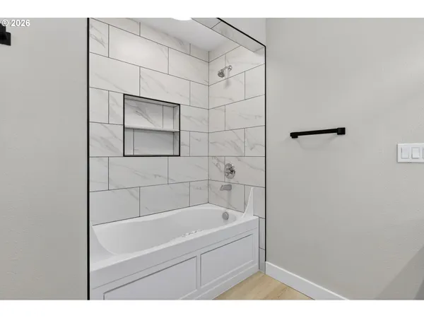 a bathroom with a bathtub