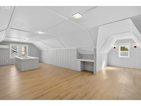 a view of a livingroom with wooden floor