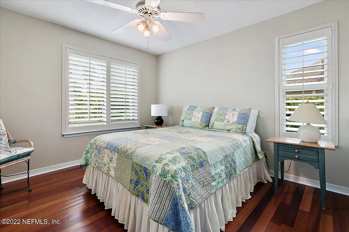 1921 Seminole Road Atlantic Beach, FL 32233 - Photo 12 of 27 a bedroom with a bed and a window