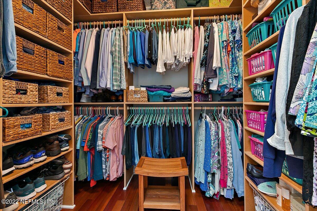 1921 Seminole Road Atlantic Beach, FL 32233 - Photo 17 of 27 a view of walk in closet with clothes and shoes