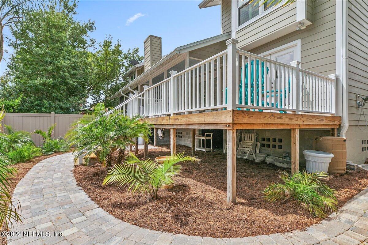 1921 Seminole Road Atlantic Beach, FL 32233 - Photo 19 of 27 a view of a house with a chairs in patio