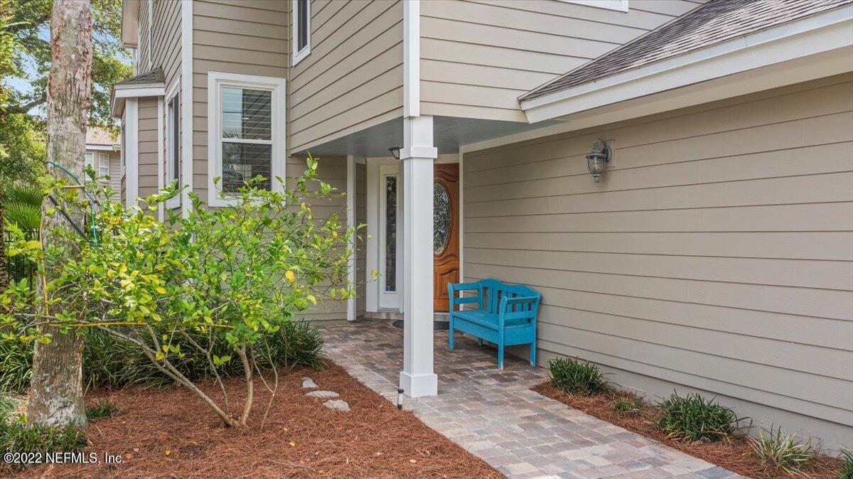 1921 Seminole Road Atlantic Beach, FL 32233 - Photo 2 of 27 a view of a chair and table in the backyard