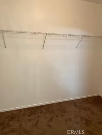 a view of a room with an empty walk in it