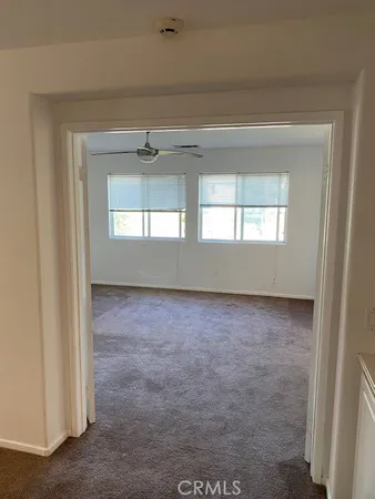 an empty room that has a window