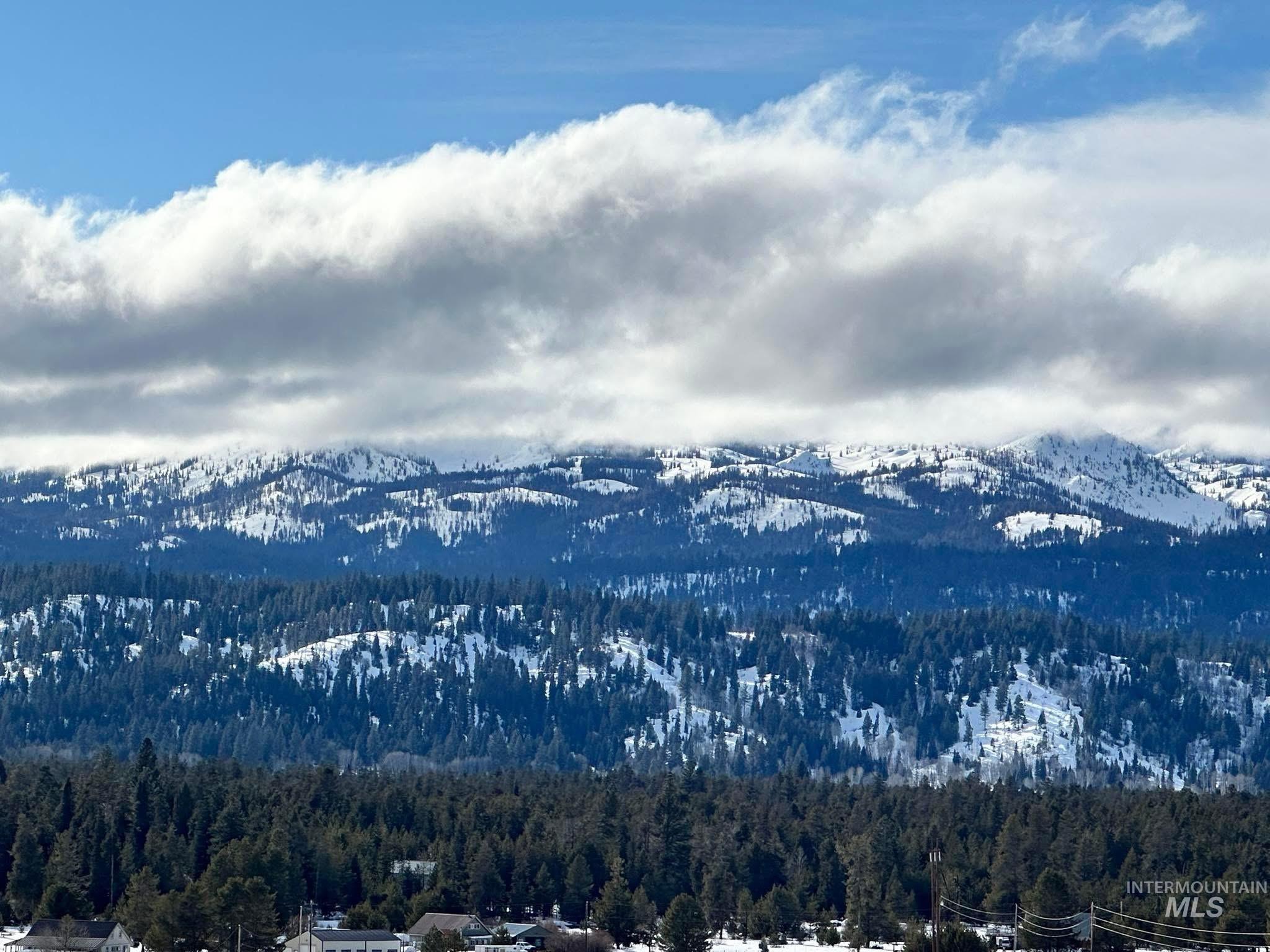 40 Atkin Lane Cascade, ID 83611 - Photo 41 of 46 Mountain backdrop featuring snow-capped peaks and vibrant sky