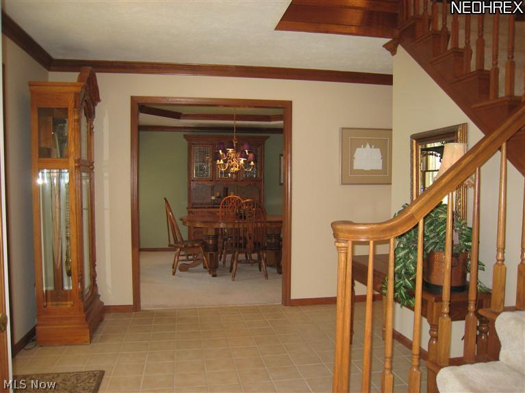 560 East Jackson Road Aurora, OH 44202 - Photo 3 of 25 Beautiful foyer w/ceramic tile floor. Turned Staircase. Spacious & Bright.