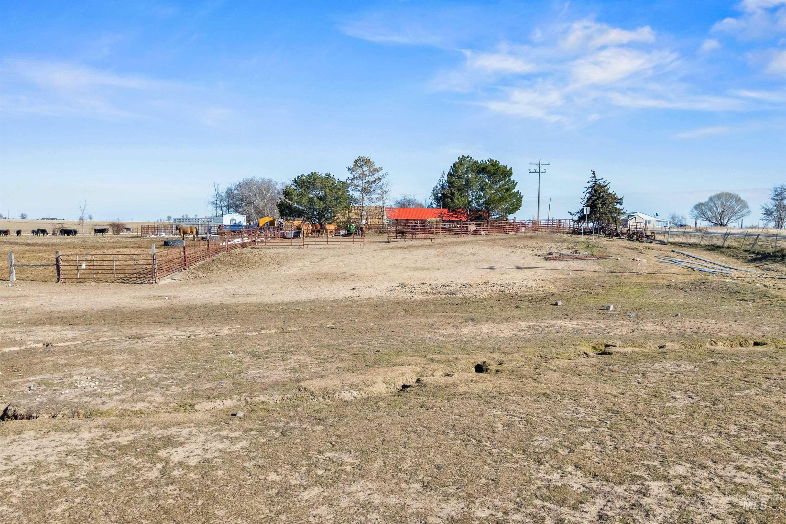 1898 East 3700th Street North Filer, ID 83328 - Photo 36 of 40 View of yard with an enclosed riding area and a view of rural / pastoral area