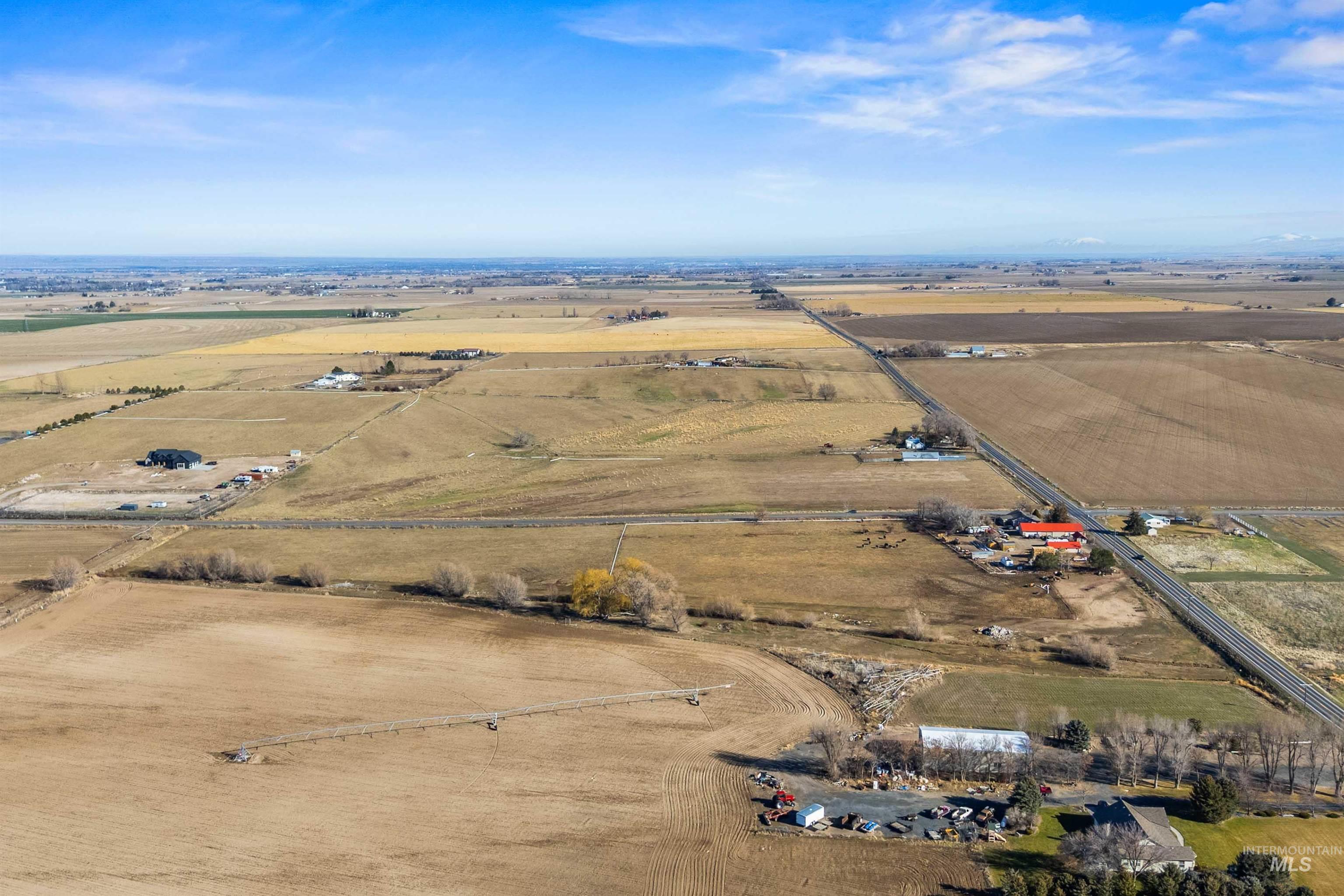 1898 East 3700th Street North Filer, ID 83328 - Photo 38 of 40 Aerial view of property and surrounding area featuring rural landscape and abundant farmland