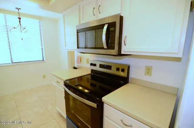 a view of a bathroom with a glass door