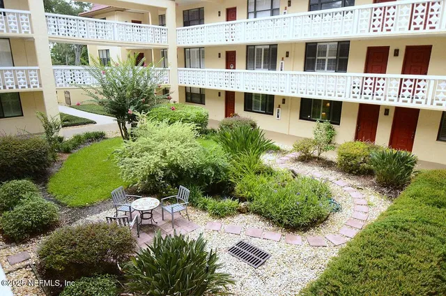 a view of cabinets and window
