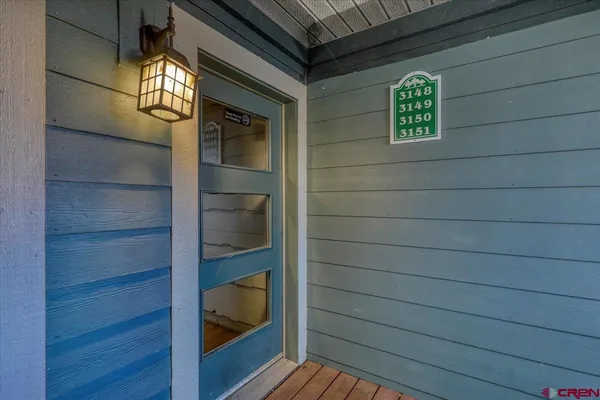 a view of front door and porch