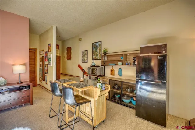 a bedroom with furniture and a bed