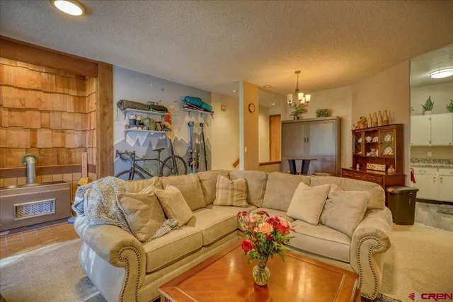 a living room with furniture and a couch