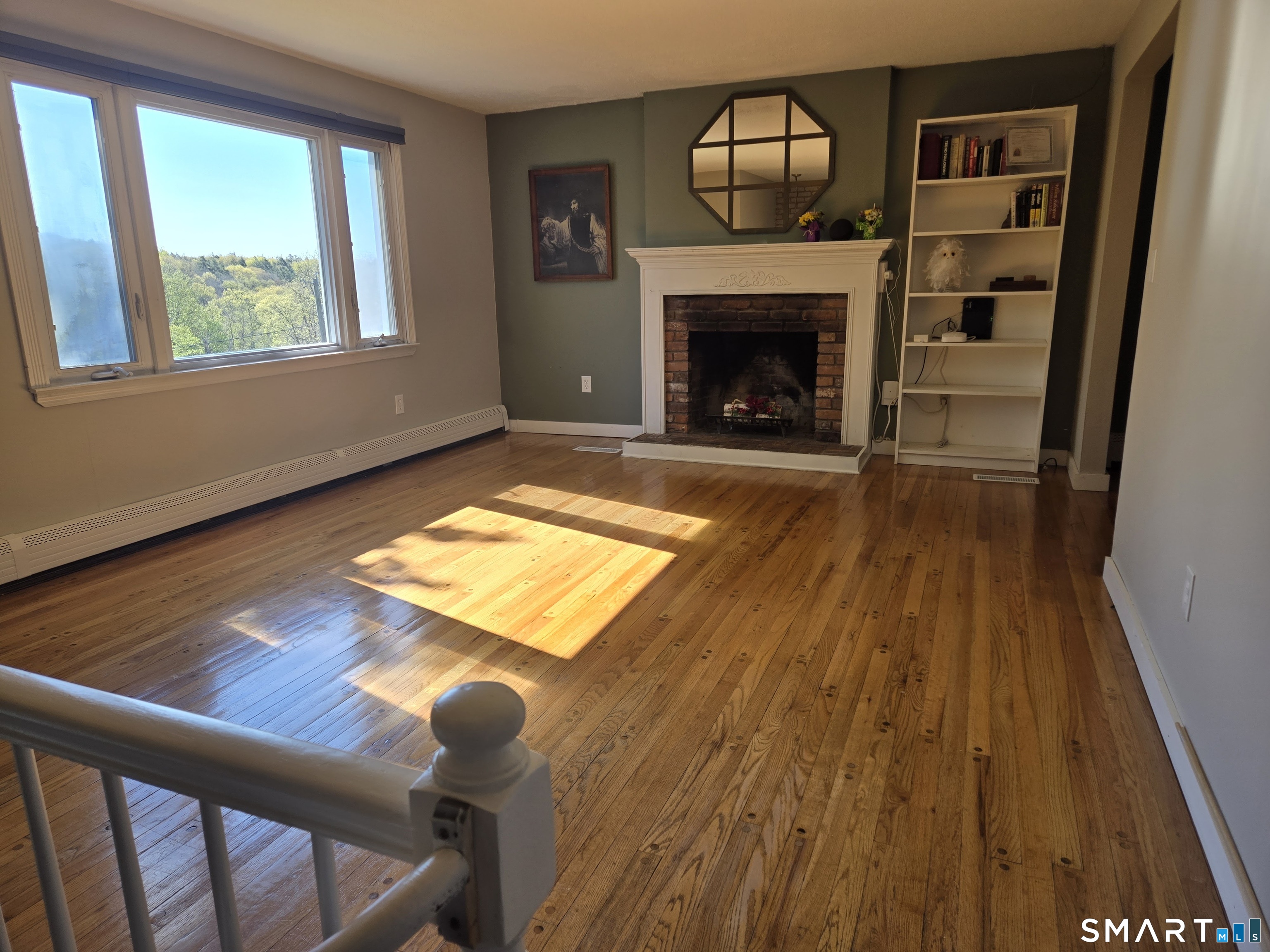 1004 Hickory Hill Road Thomaston, CT 06787 - Photo 14 of 23 a living room with a fireplace