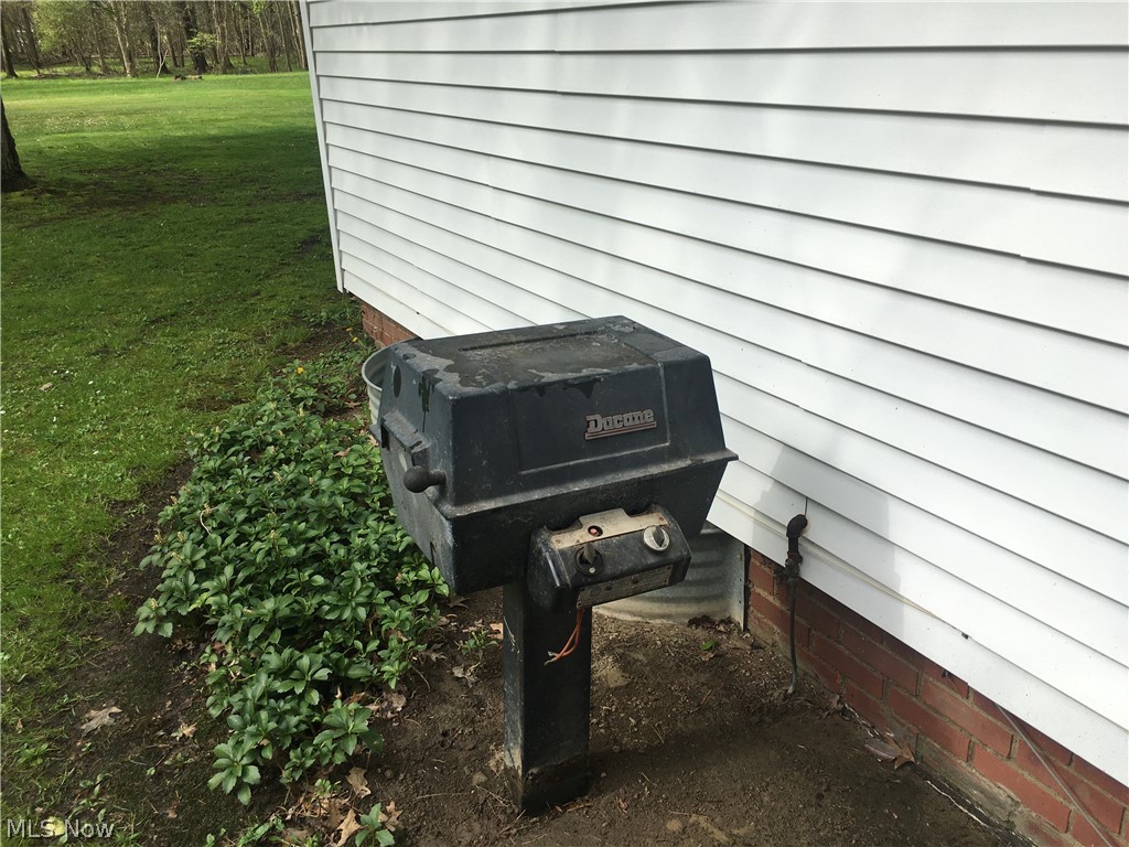 5952 Highland Road Cleveland, OH 44143 - Photo 31 of 34 Gas Grill connected to the gas line just outside the side door